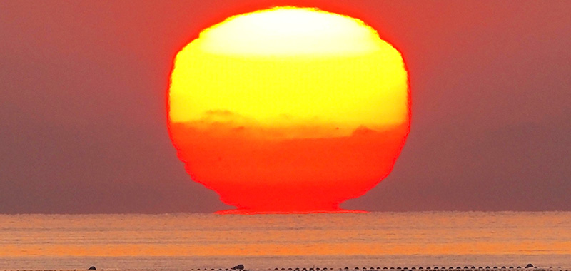 富山湾のだるま太陽